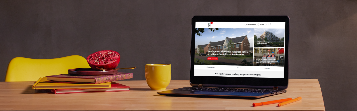 Hero banner Fijn Wonen website on laptop